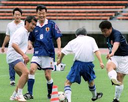 Lawmakers practice soccer for game with S. Korea